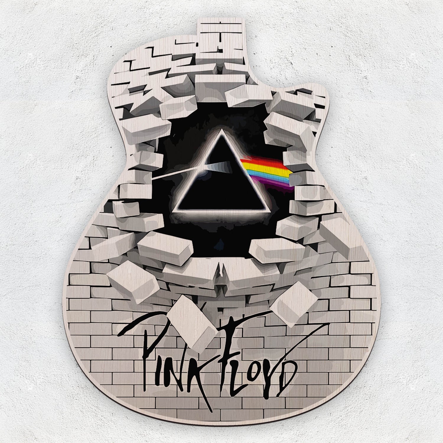 Pink Floyd wall art with guitar design and iconic triangle and rainbow logo.